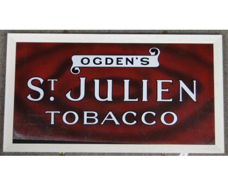 A framed enamel advertising sign for Ogden's "St. Julien Tobacco," 
38" x 20.5" overall.