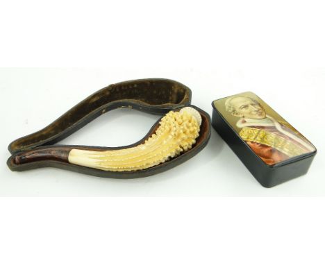A lacquer snuff box
with portrait design, 3.4" and a cased cheroot holder, (2).