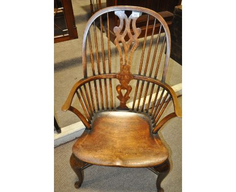 A 19th century Windsor bow armchair
 with crinoline stretcher.