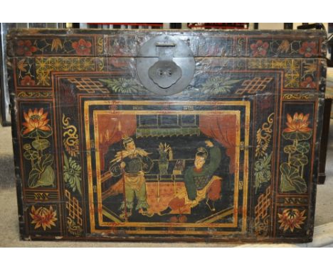 A 19th century Oriental black lacquered trunk,
with painted decoration, length 2'10", height 2', depth 21".