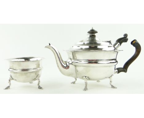 An Edwardian circular silver teapot,
with scalloped edge and matching sugar bowl, London 1907, 22oz.