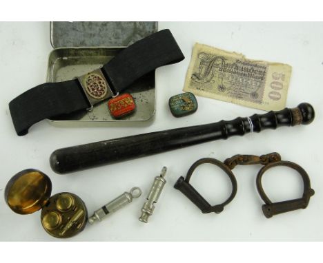 Handcuffs, truncheon, inkwell, whistles, etc.