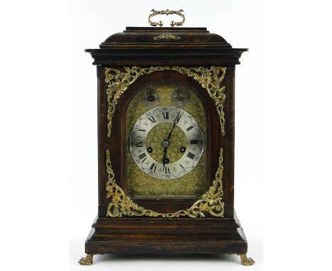 An Edwardian oak cased bracket clock,
having an engraved brass dial with 3-train movement, height 18".