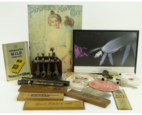 Pipes, tobacco advertising cribbage boards,
tapers tins, etc.