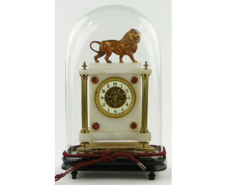 Victorian alabaster mantel clock,
having an open escapement with 8-day movement, brass columns surmounted by a lion, under gl