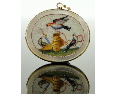 A finely detailed Italian micro-mosaic pendant,
depicting doves with a chariot, on mother of pearl ground, unmarked gold sett