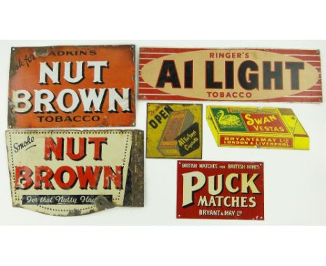 A double-sided Nut Brown sign and another, 
a Ringers A1 Light Tobacco sign, a Puck Matches sign, an enamel Swan Vestas sign,