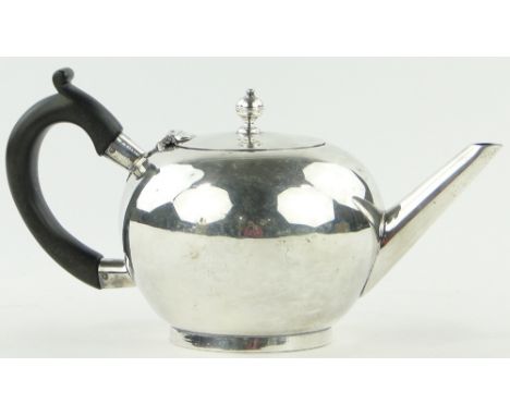 A George IV silver bullet shaped teapot,
makers John Wakelin & William Taylor, London 1823, 12.5oz.