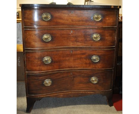 A 19th century mahogany serpentine front chest of 4 long drawers,
with brass carrying handles, raised on bracket feet, width 
