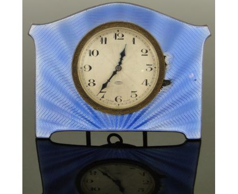 A silver and blue enamel cased travelling clock,
with 8-day movement, enamel a/f, case width 11cm.