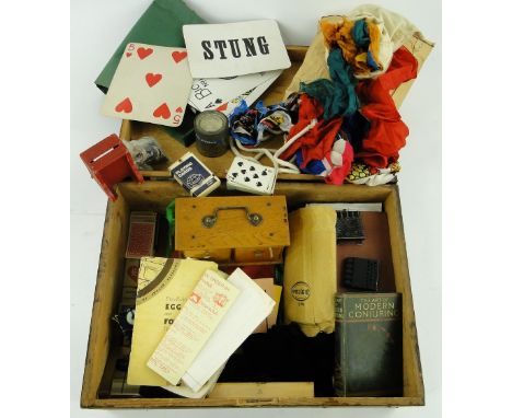 A pine box containing a large quantity of conjuring tricks,
books and props, ex property a Magic Circle member.