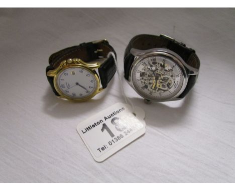 2 gent's Rotary watches.We set the time on both watches and both appear to have kept good time. There are no personal inscrip