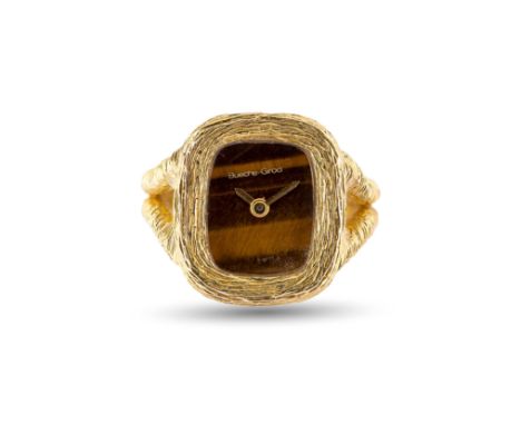 A RARE 18K SOLID GOLD BUECHE GIROD RING WATCHCIRCA 1970s, WITH TIGERS EYE STONE DIALMovement: 17J, manual wind, cal. 2442, si