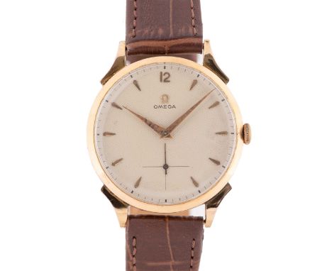 A RARE GENTLEMAN'S LARGE SIZE 18K SOLID ROSE GOLD OMEGA WRIST WATCHCIRCA 1950, WITH "HONEYCOMB" DIALMovement: 15J, manual win