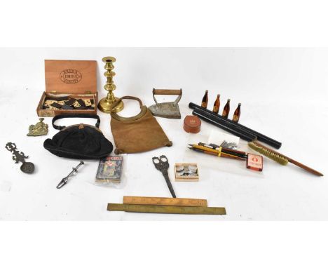 A quantity of collectors' items, including cast iron, brass candlestick, rulers, circular rulers, dominos, medals, dip pens, 
