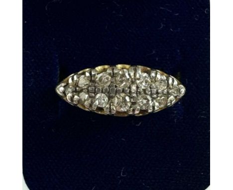 An 18ct yellow gold diamond set ring comprising twelve small stones, size O, approx 4.3g.
