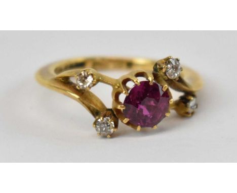 An 18ct yellow gold ruby and diamond ring, set with central ruby approx 0.75ct and four small diamonds, size J, approx 3.7g.