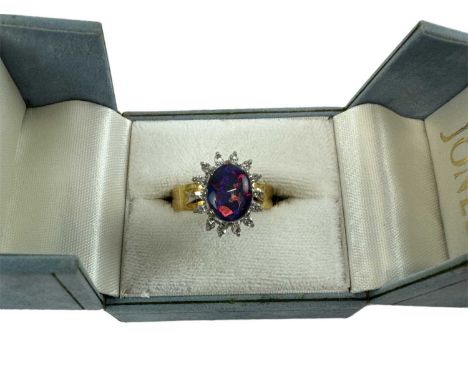An 18ct yellow gold opal and diamond set cluster ring, size R/S, approx 7.2g.