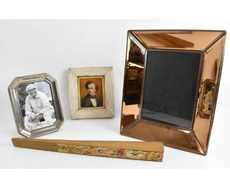 A peach glass Art Deco style easel back picture frame, 26 x 21cm, a small portrait of a classical gentleman, 8.5 x 7cm, a fra