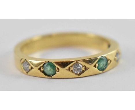 A yellow metal diamond and emerald ring, set with three small diamonds and three small emeralds, size P, approx 4.2g.