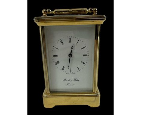 MORRELL &amp; HILTON; a modern brass cased carriage clock, height 13.5cm.