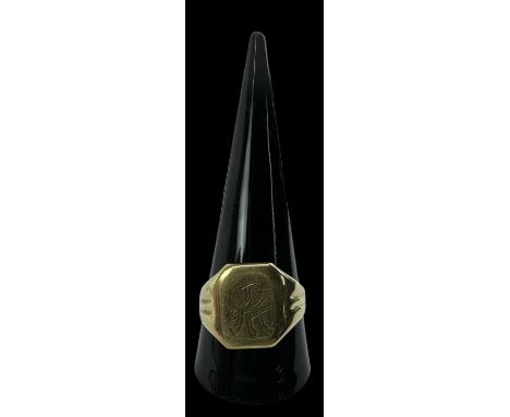 A yellow metal gentleman's signet ring with monogram, size U, approx 3.9g.