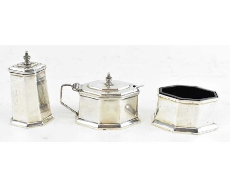 MAPPIN &amp; WEBB; an Edward VIII hallmarked silver Art Deco designed three piece cruet, the lidded mustard and open salt wit