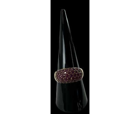 A 9ct yellow gold ruby ring set with approximately forty-four small rubies, size P, approx 3.5g.