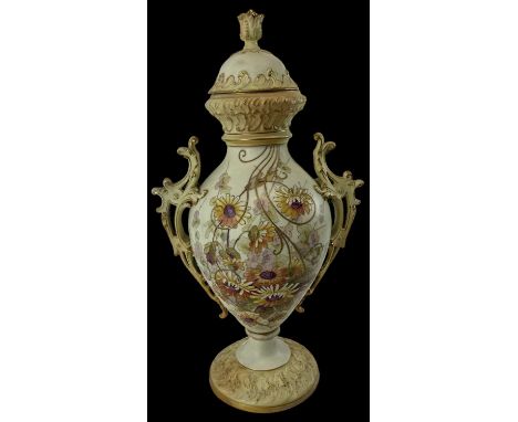 A German hand painted porcelain twin handled lidded urn with floral decoration, height 46cm.Condition Report: Over all condit