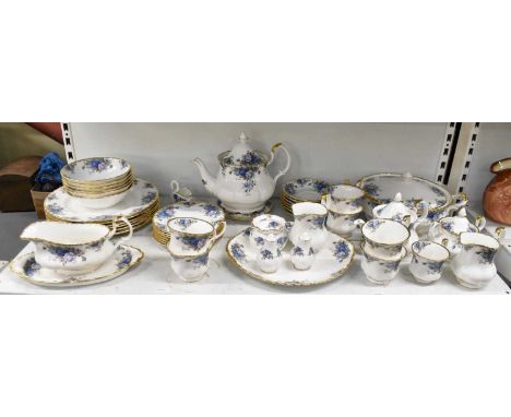 ROYAL ALBERT; a part tea and dinner service decorated in the 'Moonlight Rose' pattern, comprising teapot, teapot stand, six l