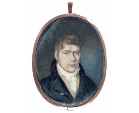 λ English School early 19th century  Portrait miniature of a gentleman, head and shoulders  Oval, gilt frame, a silhouette of