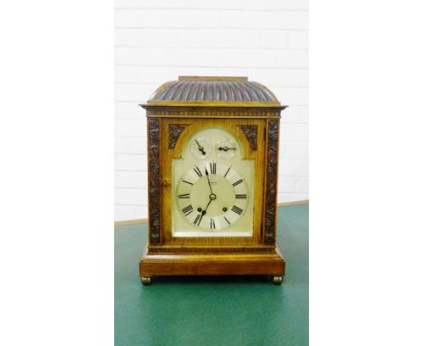 An oak cased mantle clock, the silvered dial inscribed J. Weir, Glasgow, with chapter ring and Roman numerals and two subsidi