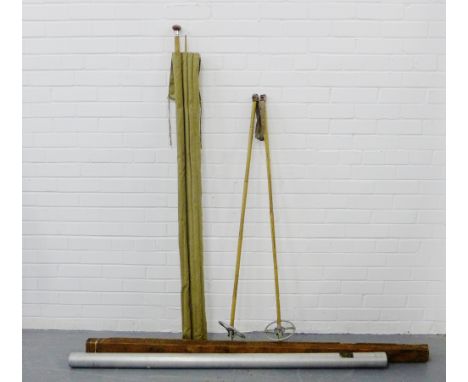 A pair of vintage ski poles, together with two fishing rods and boxes, (a lot) 