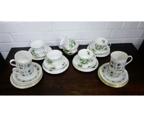 A Royal Albert Trillium patterned teaset, together with a Royal Doulton Tapestry pattern teaset, (26) 