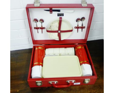 A Sirram red vinyl picnic hamper complete with thermos flask and picnic set