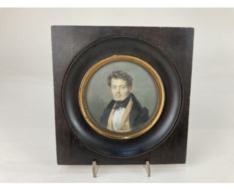 19th century Portuguese school, miniature portrait of a gentleman, by repute Jose Cinatti, tondo, inscribed in pencil verso, 