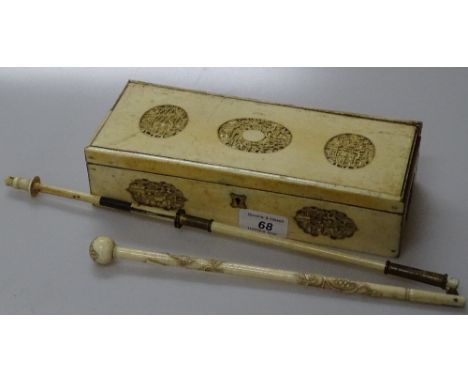 A 19th century Chinese ivory box with relief carved panels, width 9.5" and a Chinese carved ivory parasol handle.