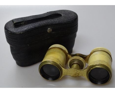 Pair of 19th century ivory opera glasses, leather cased.