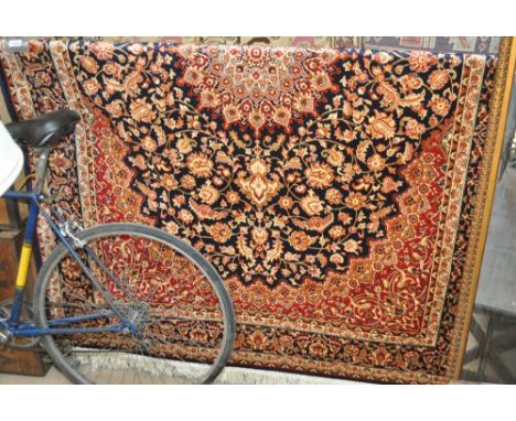 A blue ground Keshan carpet, 230 x 160cm.