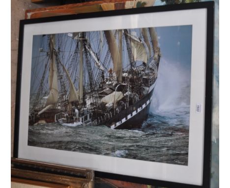 A large coloured photograph, sailing ship in rough seas, and an naive oil on board, portrait study, signed.