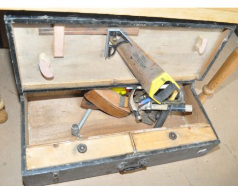 A stained pine carpenter's tool box and tools.