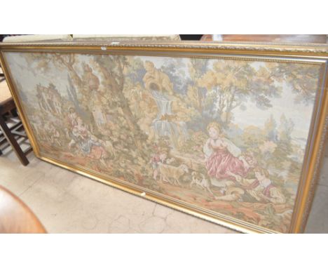 A large Belgian tapestry depicting figures, gilt framed.