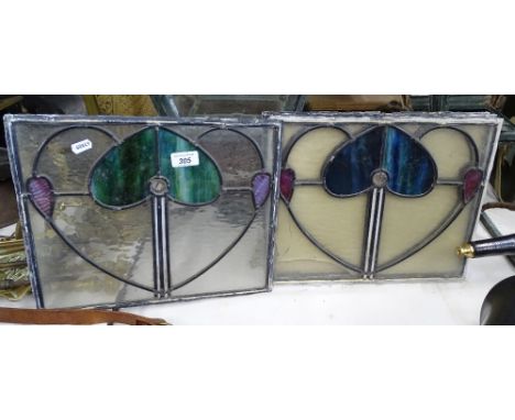 A set of 4 Art Nouveau style lead light stained glass panels.
