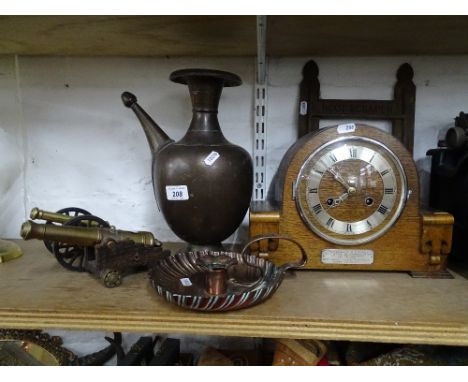 Table cannon, brass jug, oak 2-train mantel clock, etc.