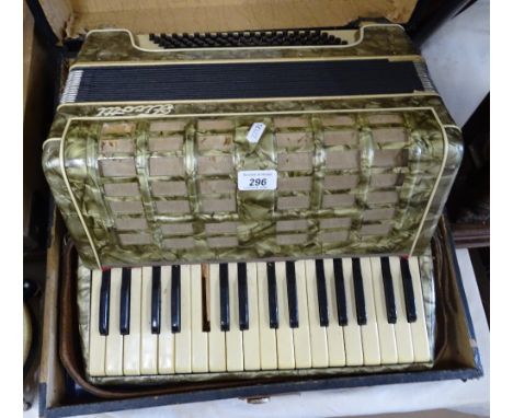 A Firotti piano accordion in case.