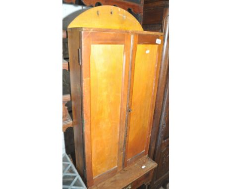 A small pine hanging 2-door tool cabinet, width 46cm.