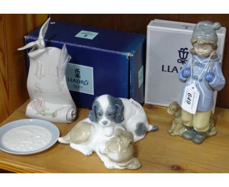 NAO hiker, Lladro scroll and salver and NAO puppies.