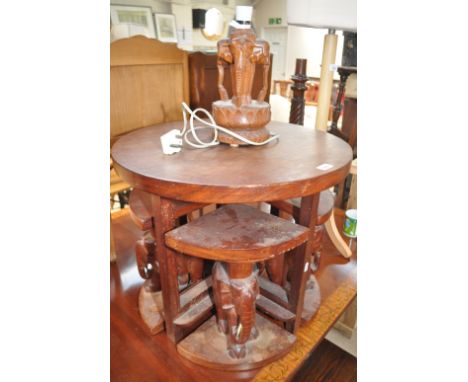Elephant design hardwood lamp and a similar design nest of 4 tables