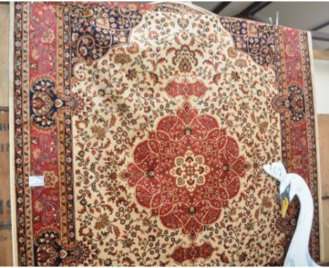 A beige ground Keshan carpet, 280 x 200cm.