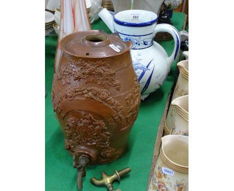 19th century salt glazed Stoneware flagon with Coat of Arms and tap and a continental blue and white wine jug.
